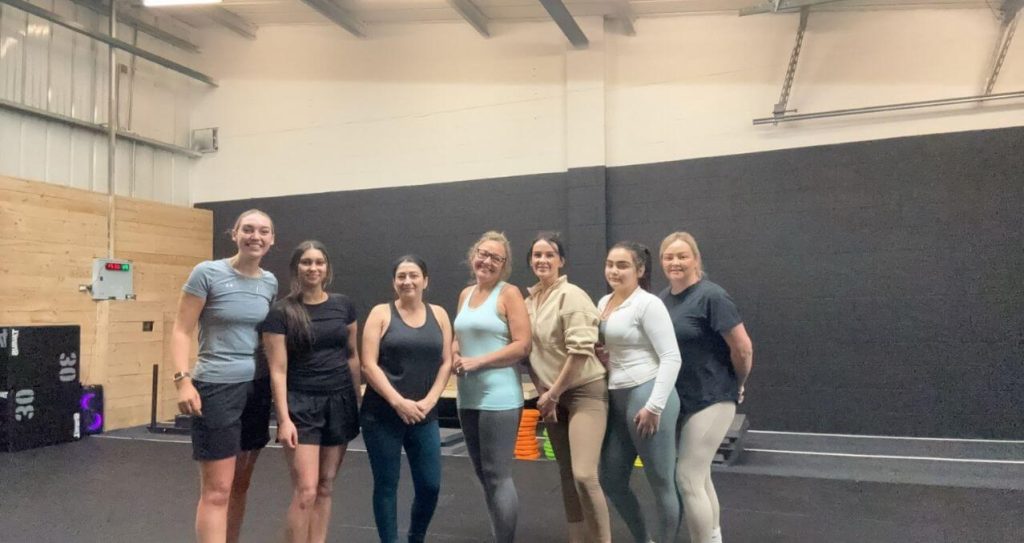 Women enjoying group fitness class in private studio